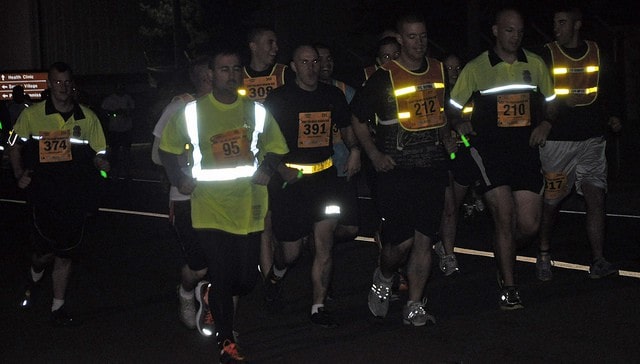 men running marathon at night